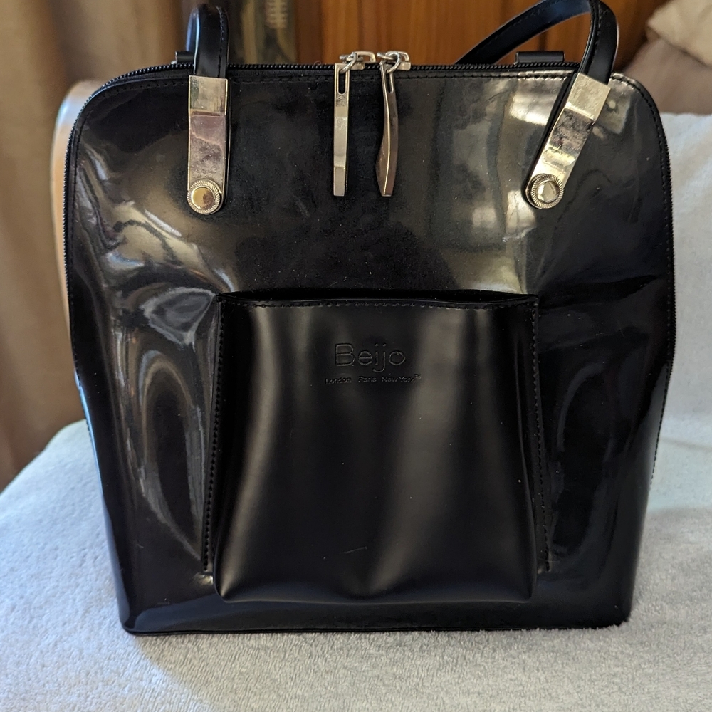 Beijo  faux patent leather convertible backpack.